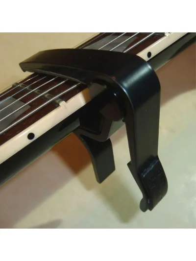 Каподастр Dunlop 83CB Trigger Capo Acoustic Curved Black