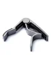 Каподастр Dunlop 83CS Trigger Capo Acoustic Curved Smoked Chrome